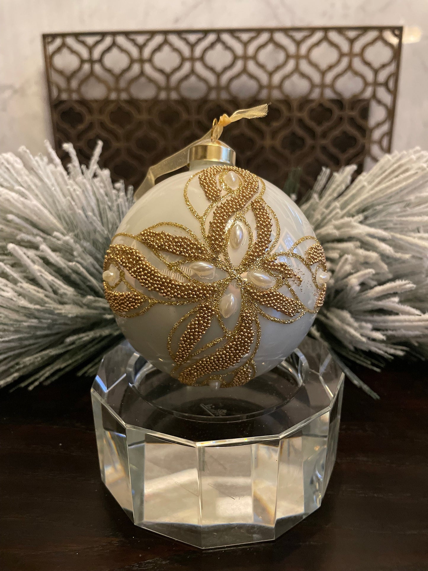 Set of 2. 4" glass ivory and gold embellished with pearls ornament ball.