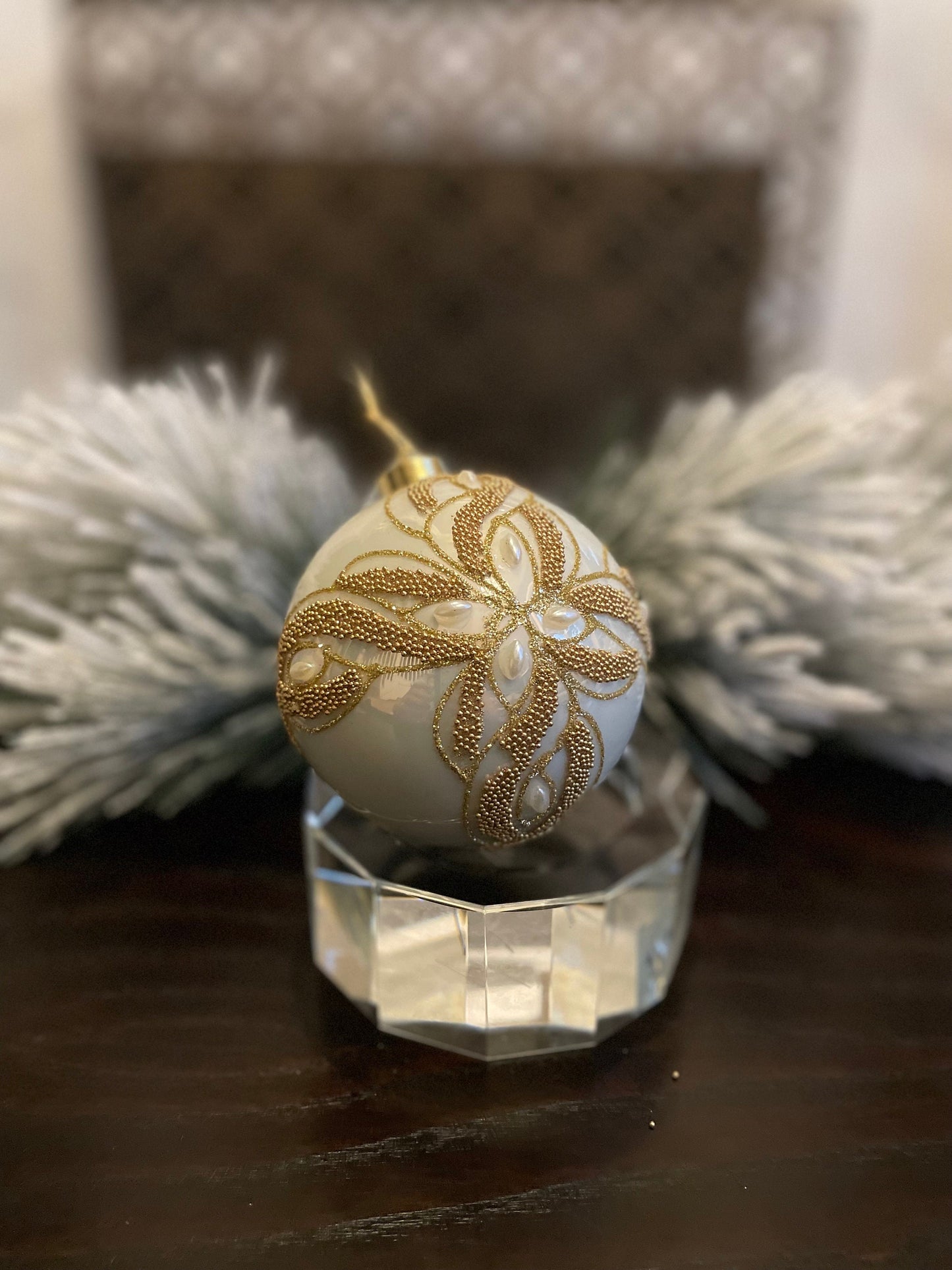 Set of 2. 4" glass ivory and gold embellished with pearls ornament ball.