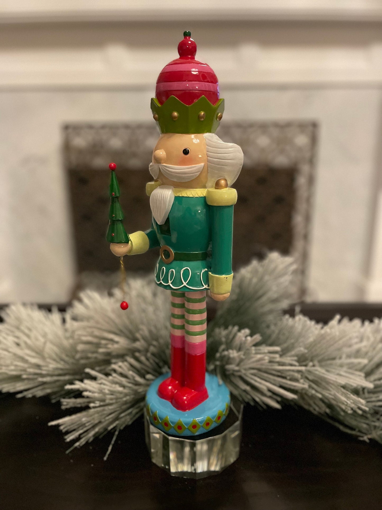 16.5” Nutcracker with tree, resin. Tabletop.