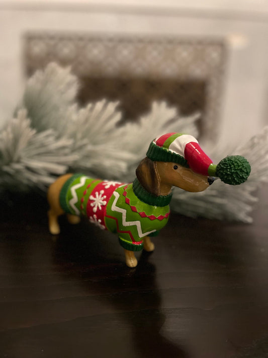 5.5” resin dachshund in Christmas sweater. Tabletop.