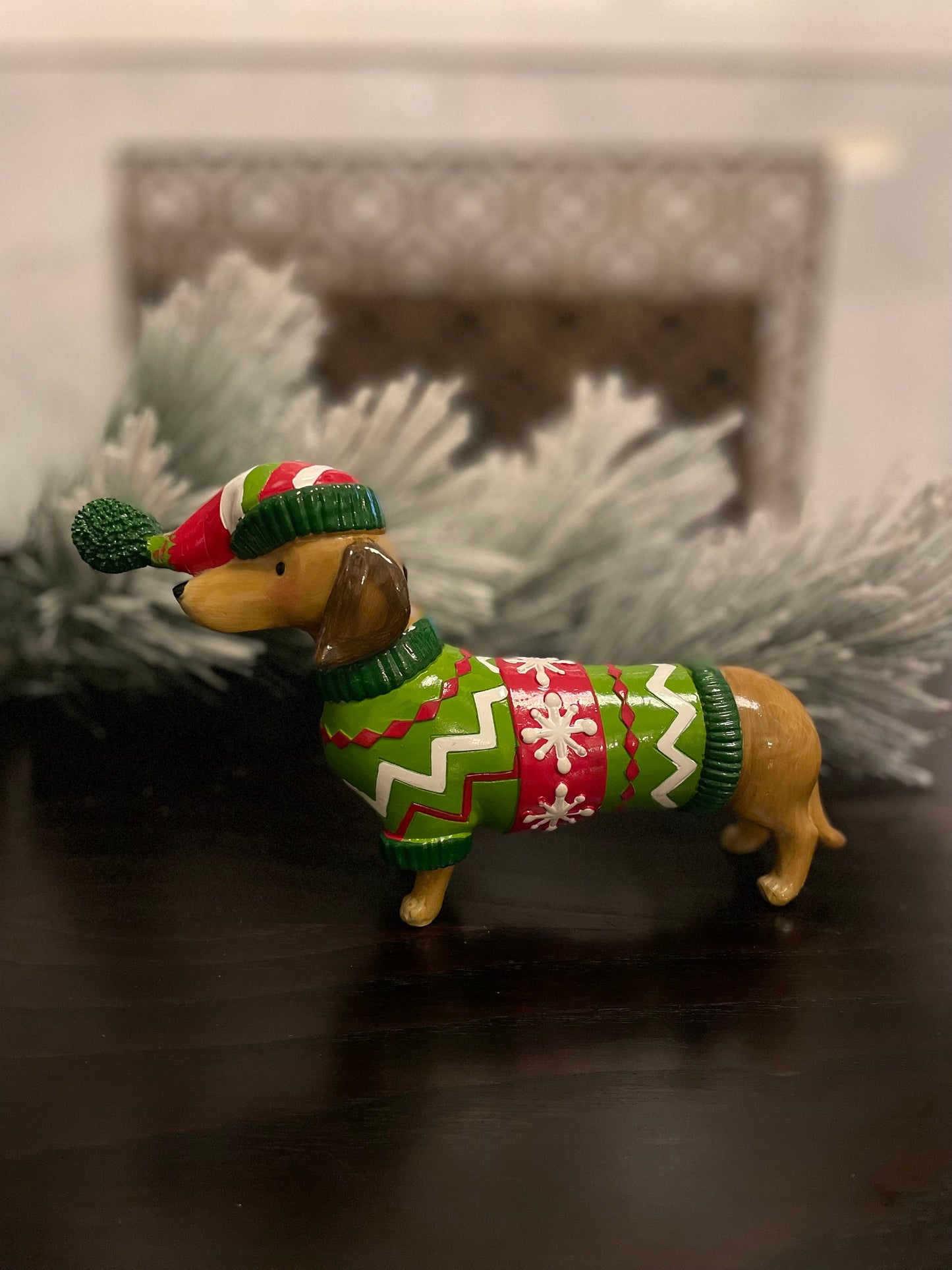 5.5” resin dachshund in Christmas sweater. Tabletop.