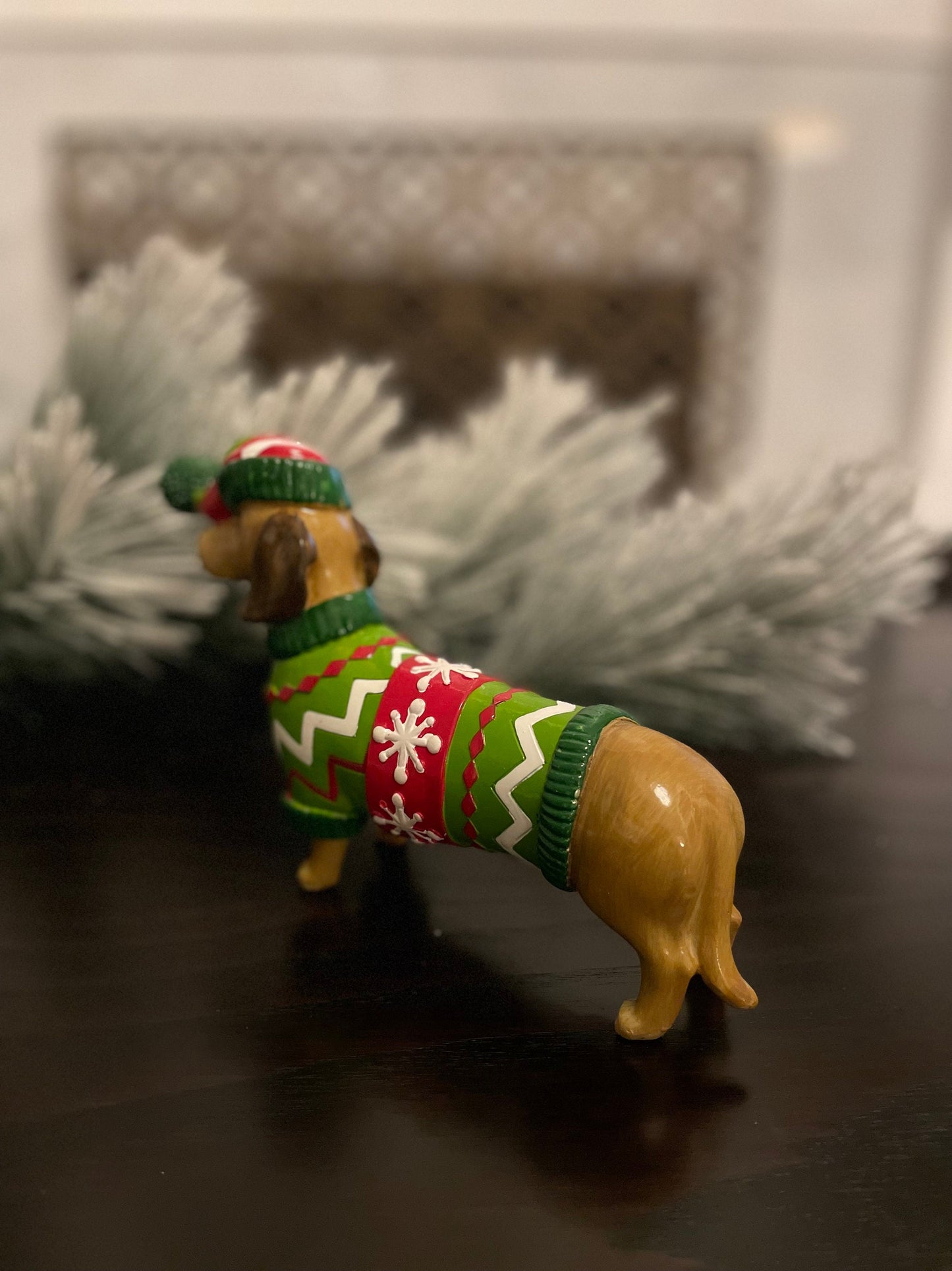 5.5” resin dachshund in Christmas sweater. Tabletop.