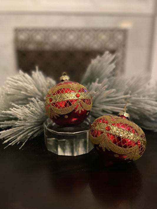 Set of 2. 4" Glass garland draped ball and finial ornament.