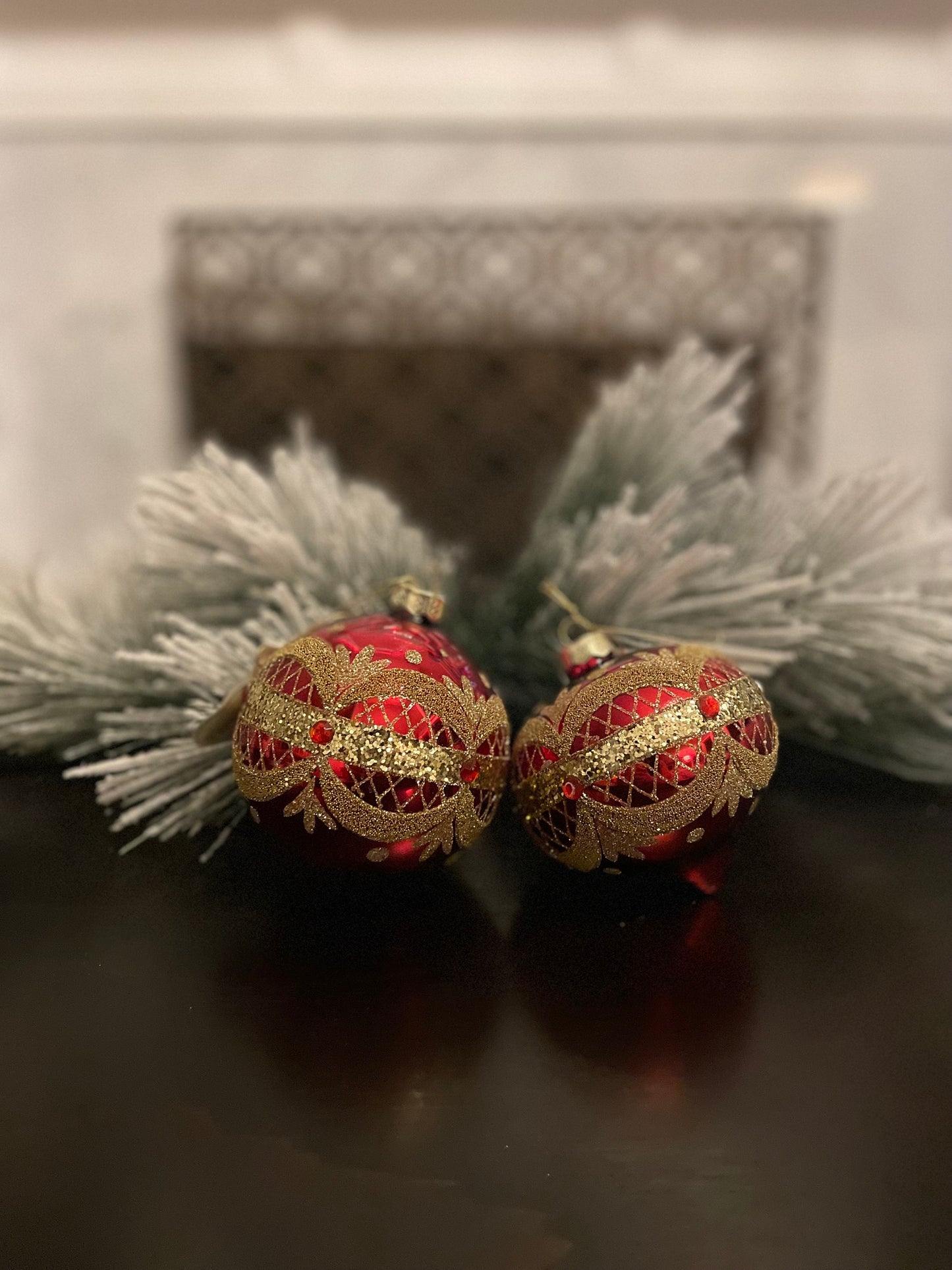 Set of 2. 4" Glass garland draped ball and finial ornament.