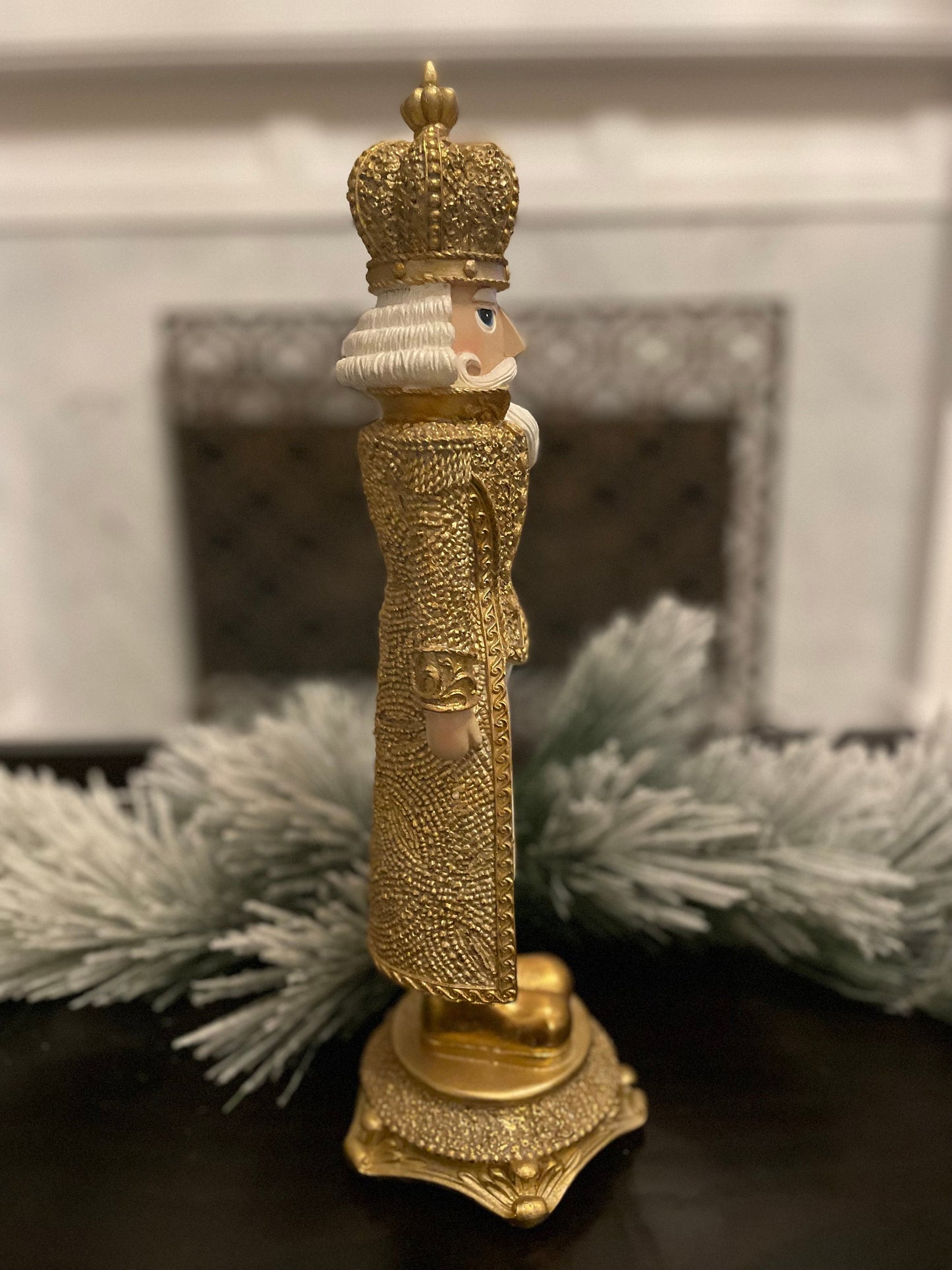 18” Nutcracker resin diamond opulent. Gold and white.