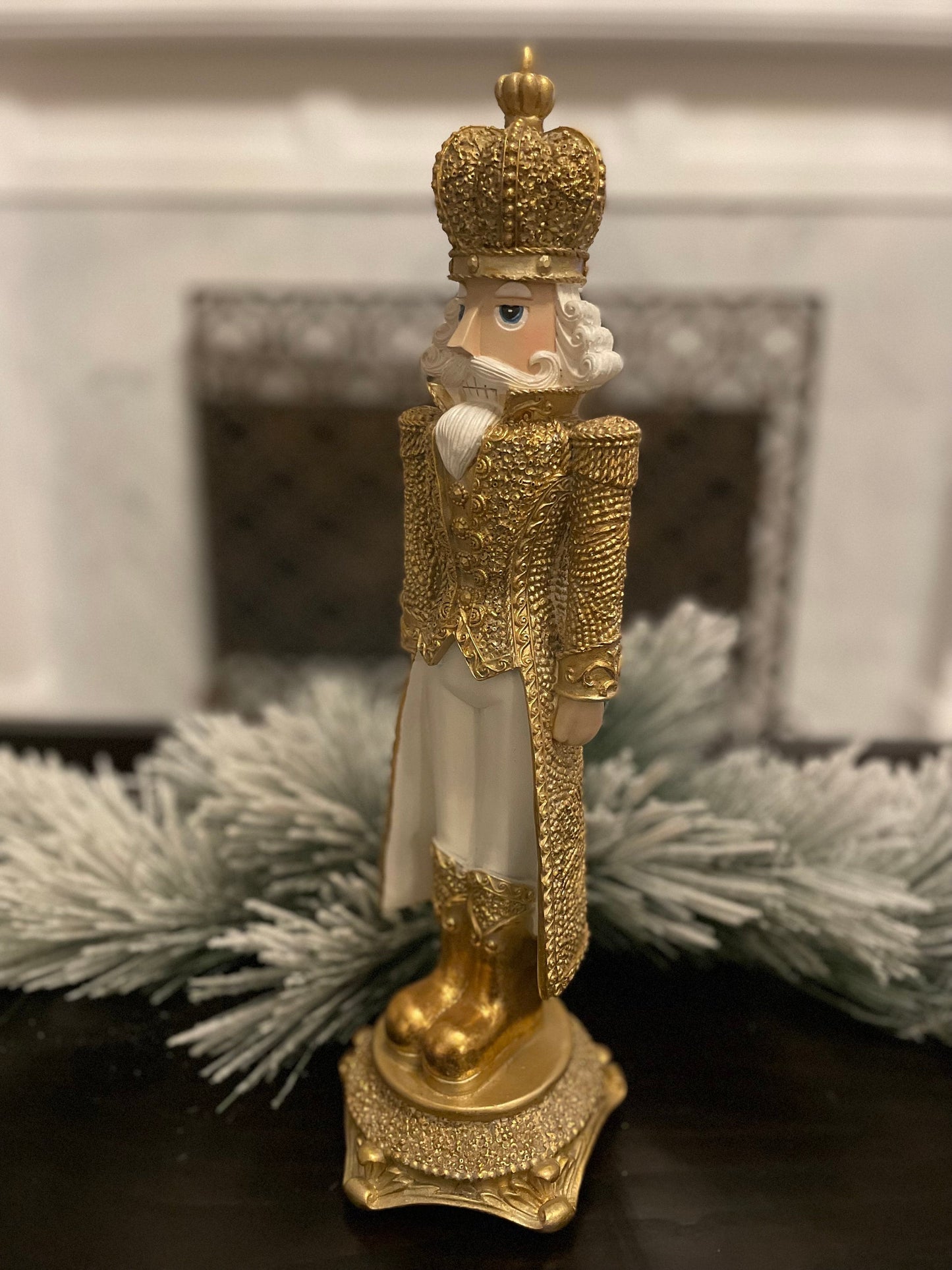 18” Nutcracker resin diamond opulent. Gold and white.