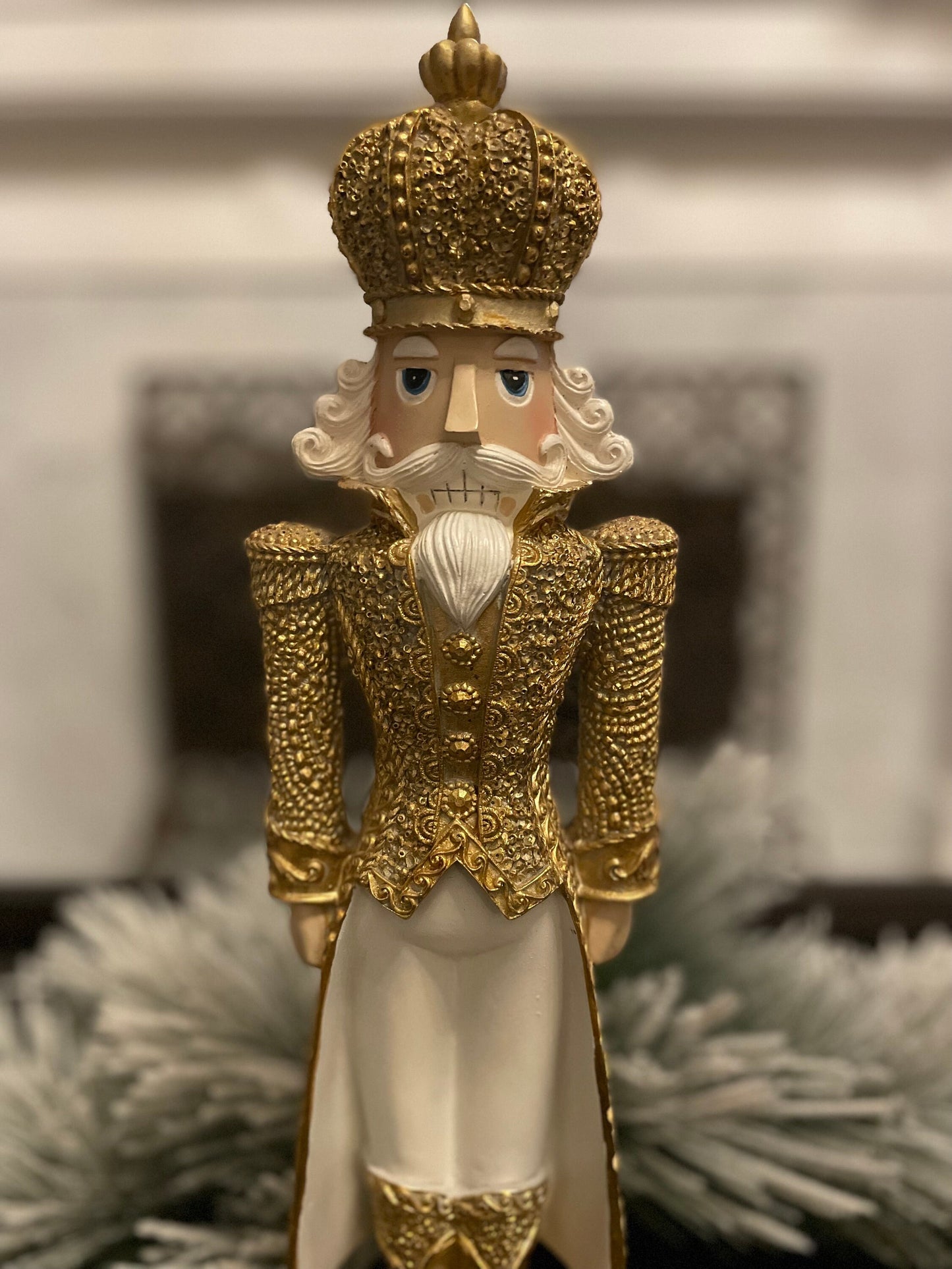 18” Nutcracker resin diamond opulent. Gold and white.