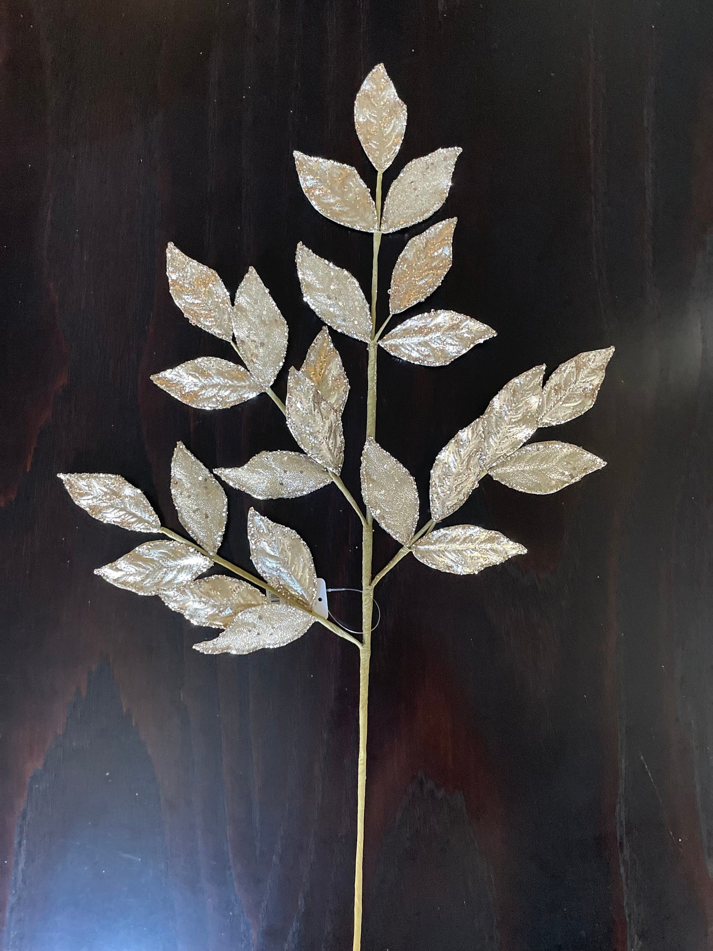 29” Champagne glittered leaf spray.