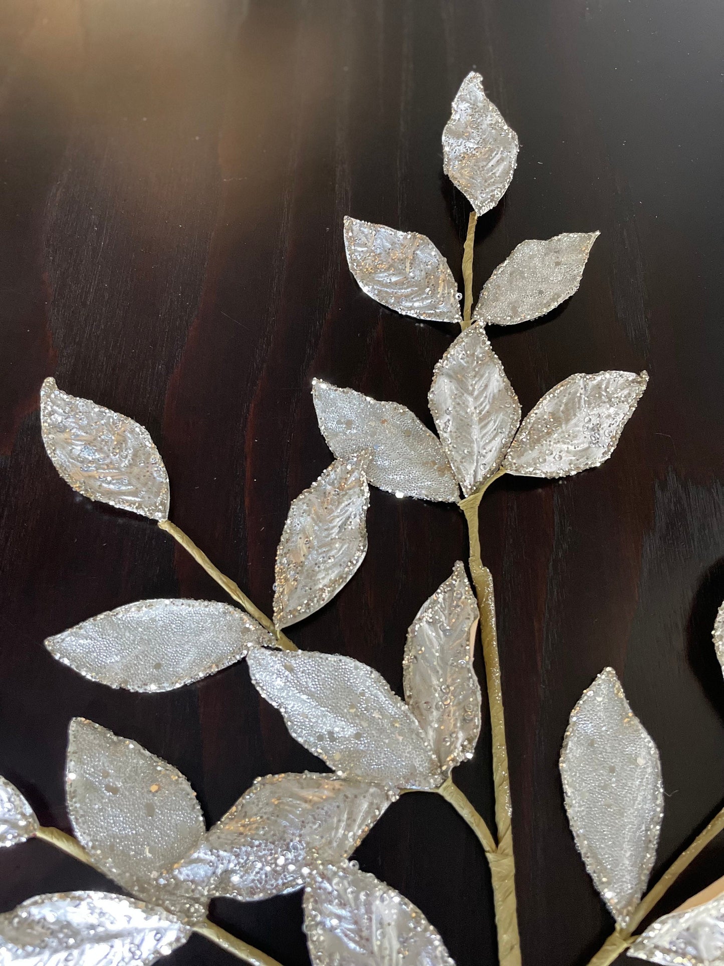 29” Glittered silver leaf spray.