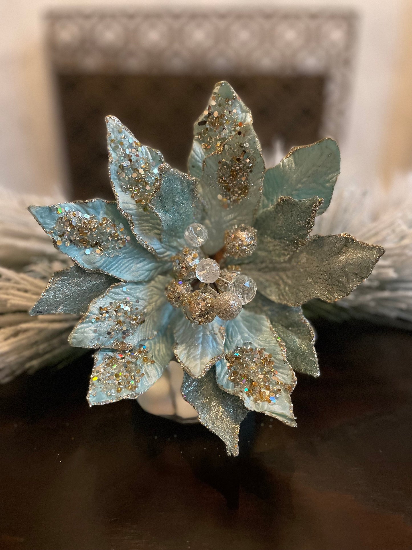 18" Poinsettia jewel stem. Soft blue platinum.
