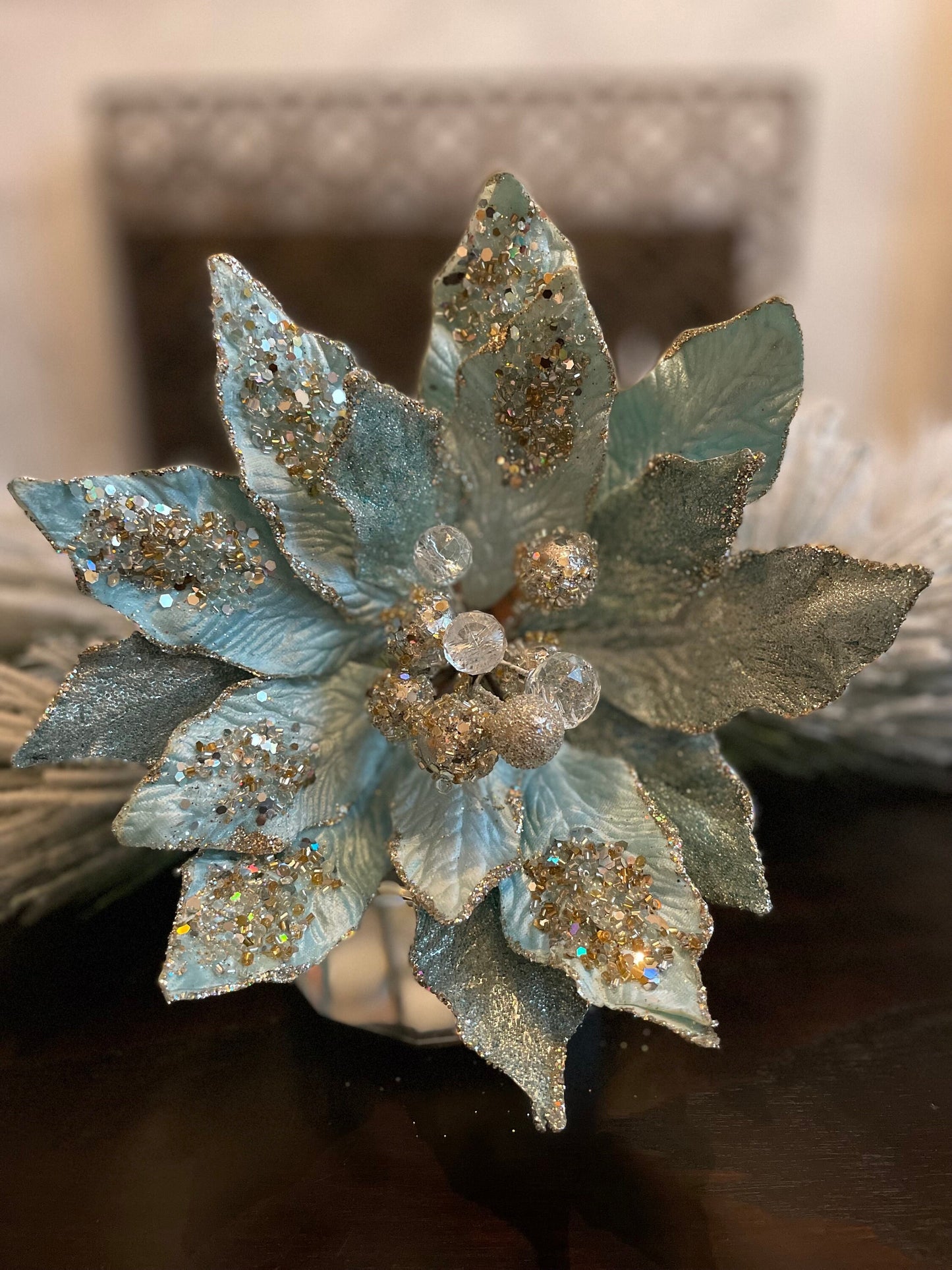 18" Poinsettia jewel stem. Soft blue platinum.
