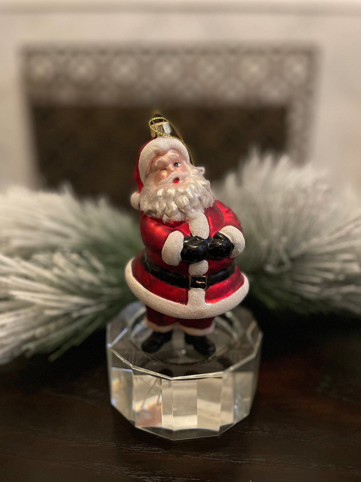 6" glass wink santa ornament.