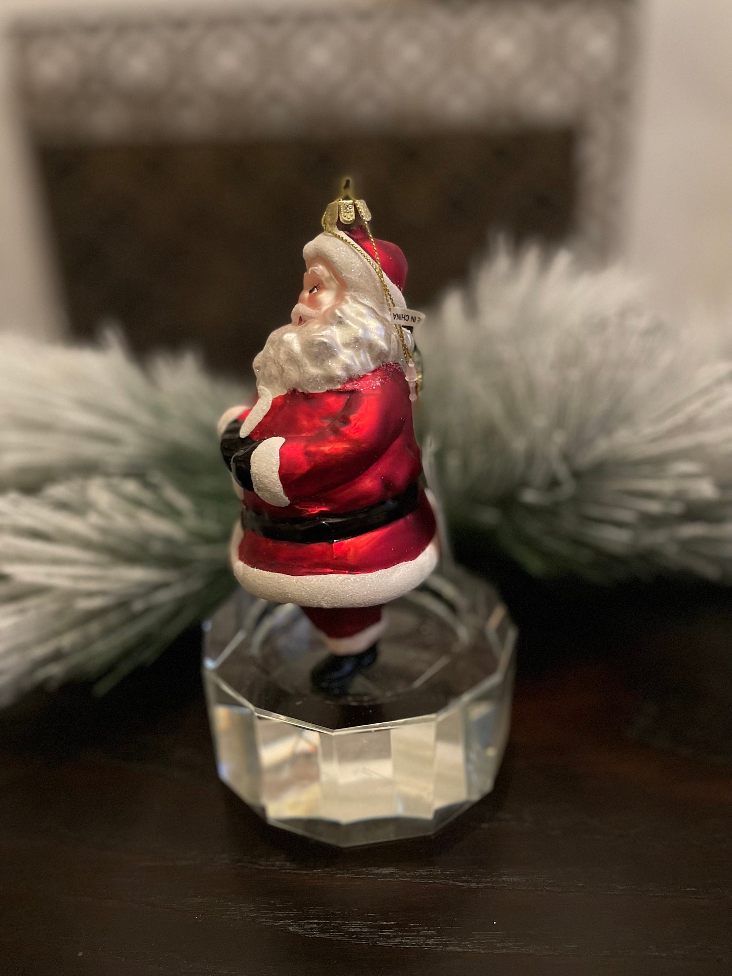 6" glass wink santa ornament.