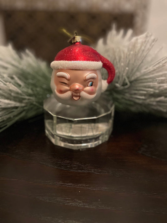 4" Winking Santa ornament. Glass.