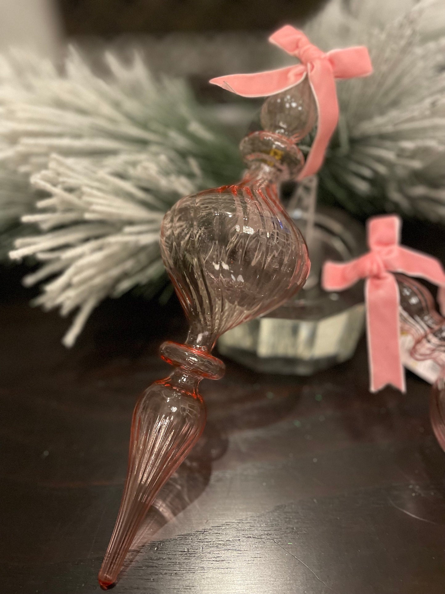 Set of 2. 11” Clear pink blown glass finial ornament.