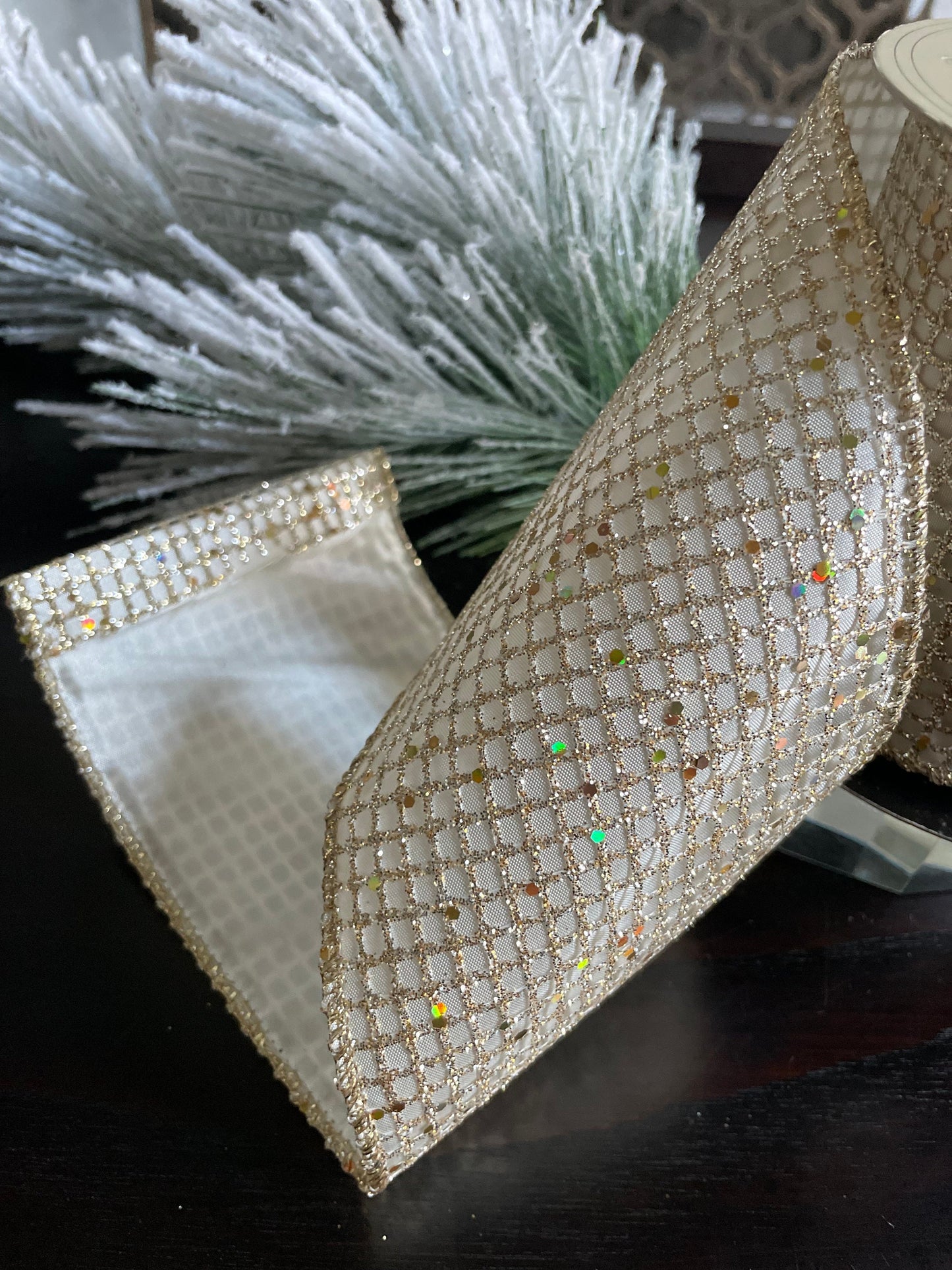 4” x 10 yds. Designer taffeta glitter mesh platinum-ivory ribbon. Wired. D. Stevens.