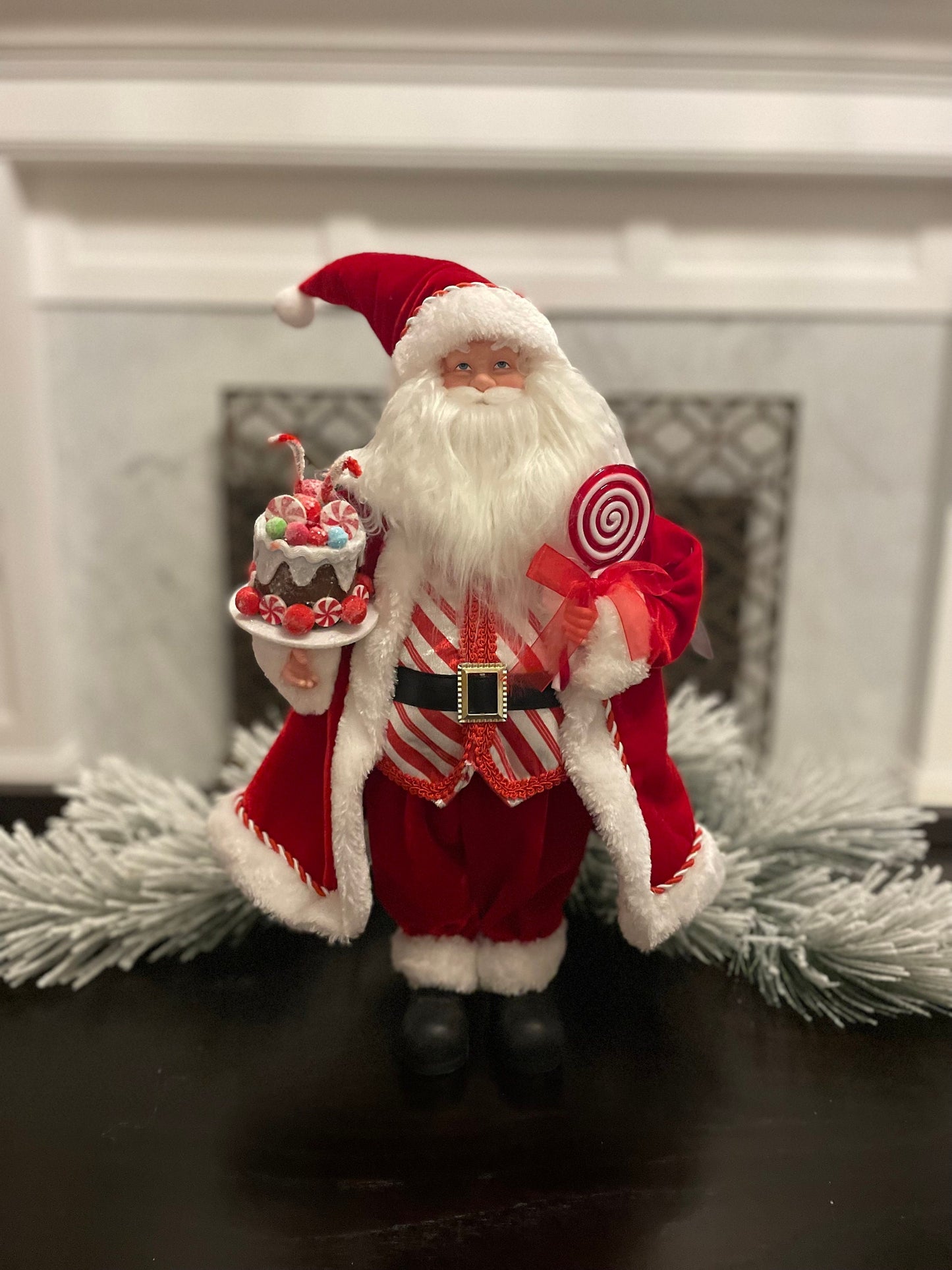 19” Merrymint Santa. Santa holding a cake.