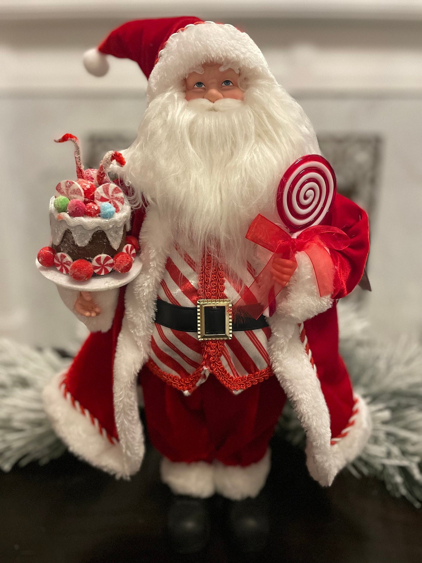 19” Merrymint Santa. Santa holding a cake.