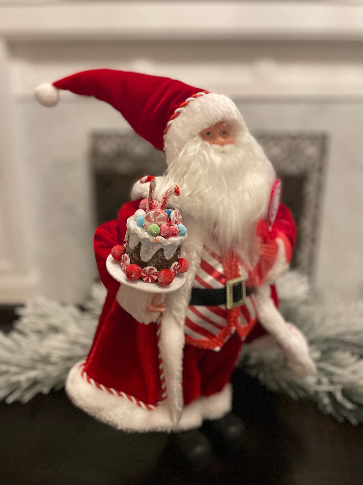 19” Merrymint Santa. Santa holding a cake.