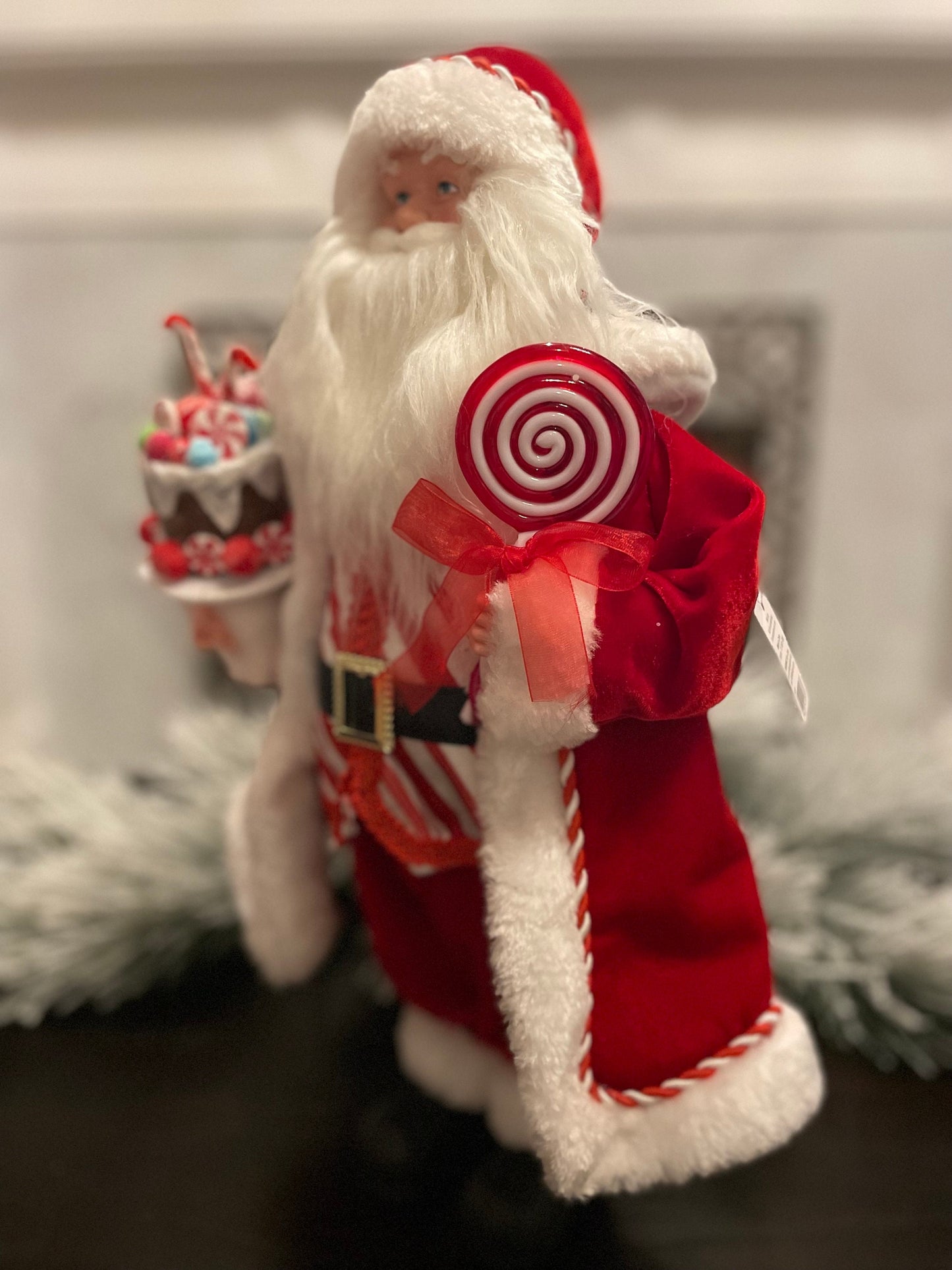 19” Merrymint Santa. Santa holding a cake.