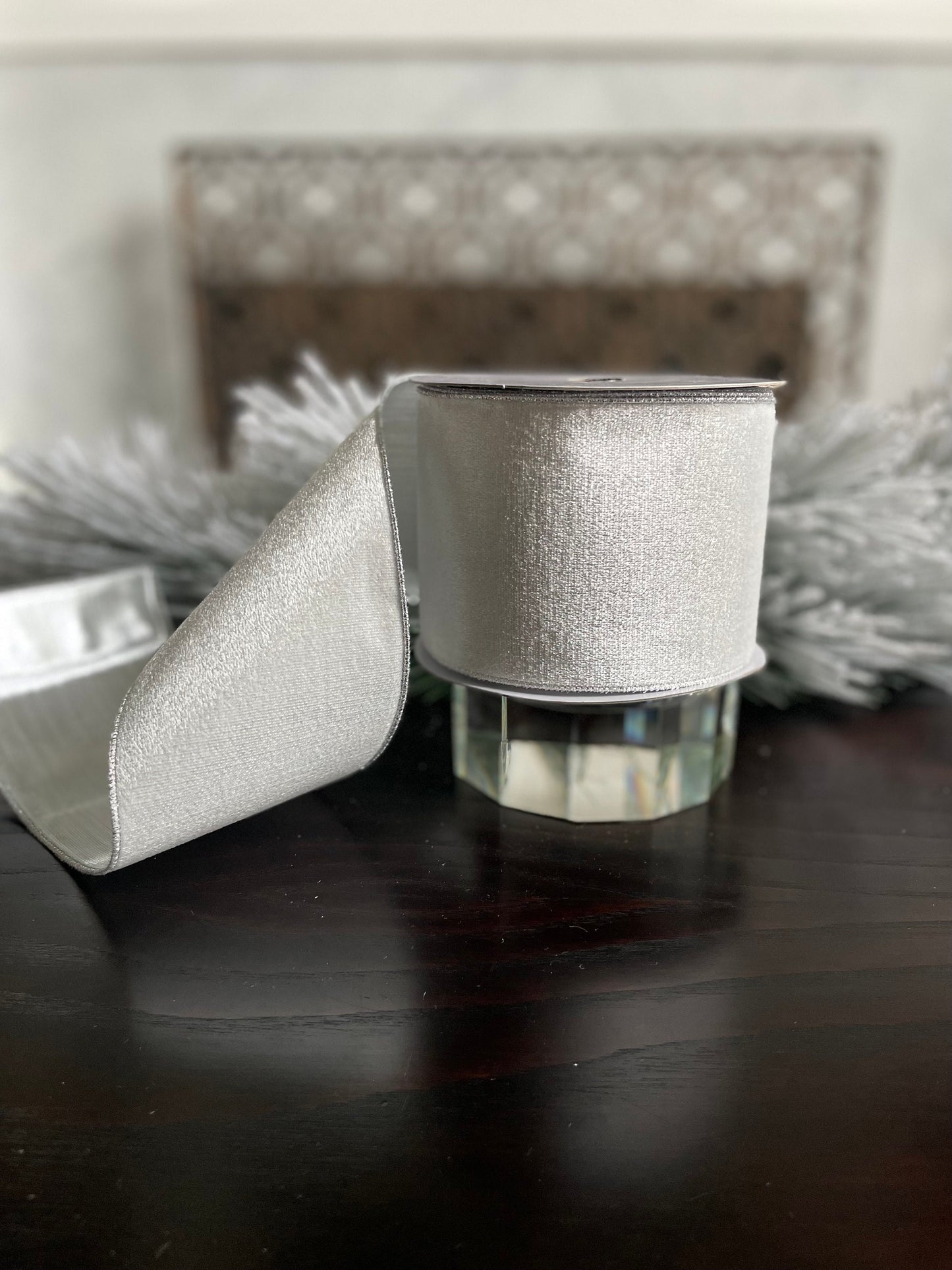 4” x 10 yds. White velvet and metallic silver back ribbon. Wired. Regency.