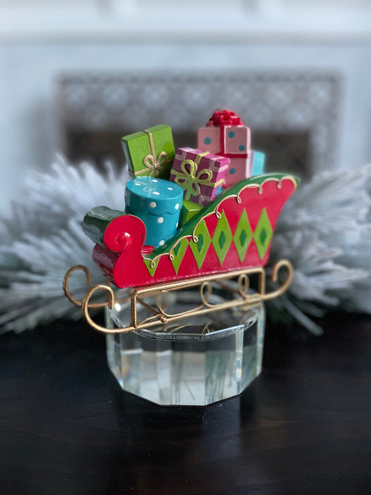 6” Resin sleigh with packages, tabletop ornament. Christmas. Multi color.