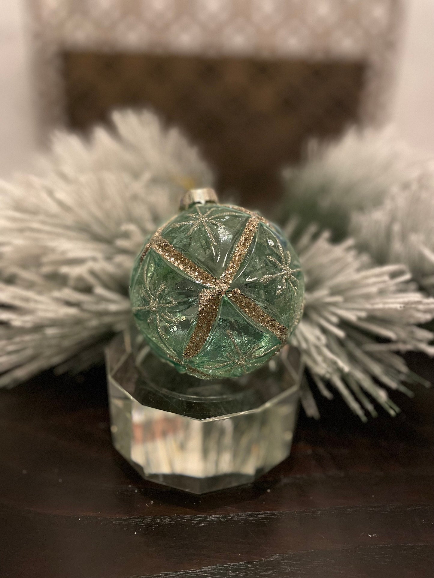 Set of 2. 4" glass clear starburst. Aqua and gold.