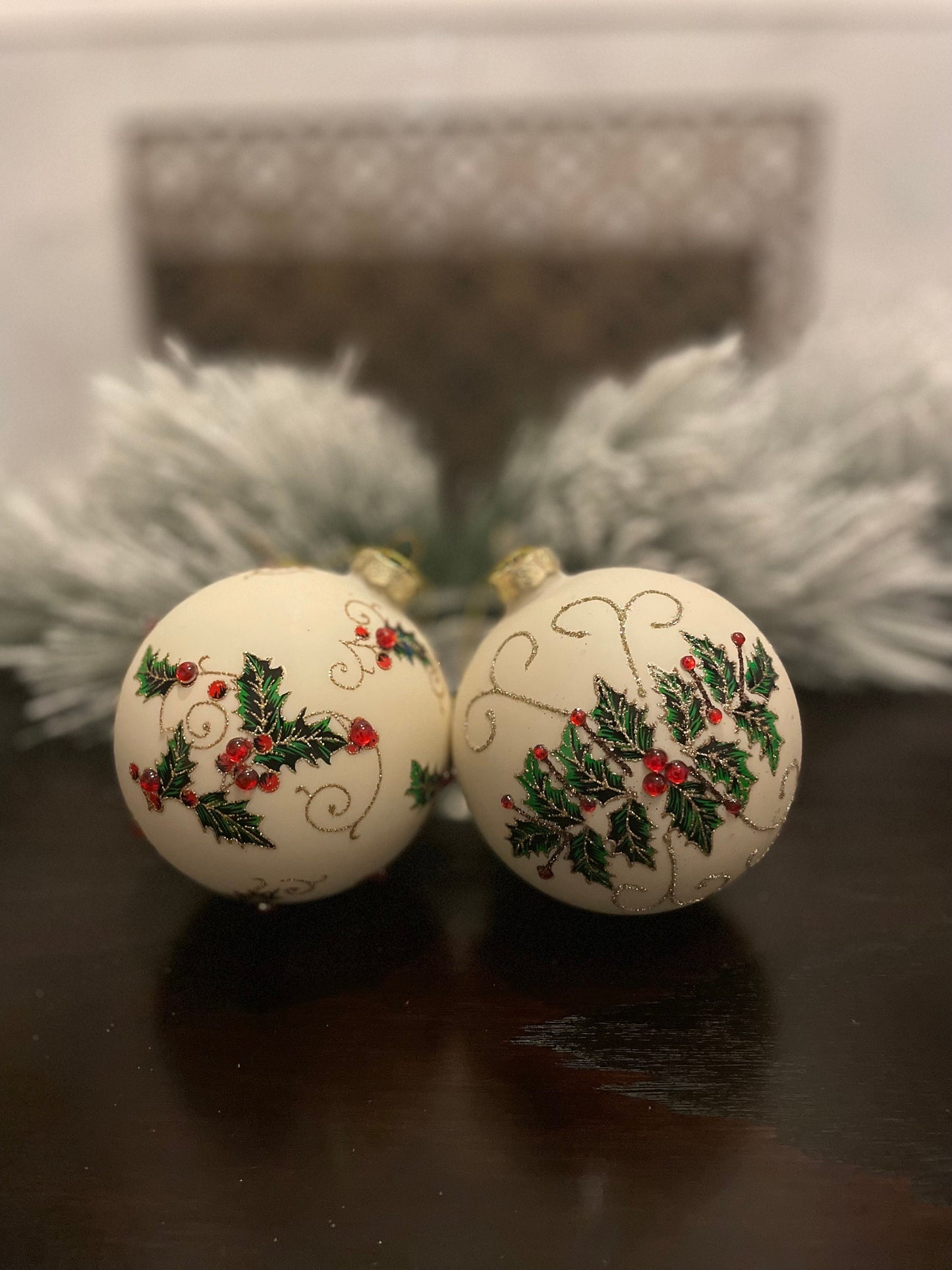Set of 2. 4" Glass jewel holly vine ball ornament.