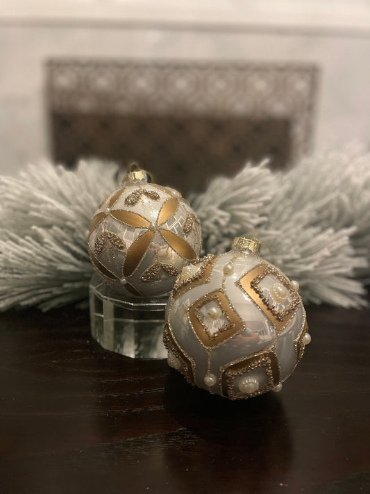 Set of 2. 4" glass gilded regal ornament.