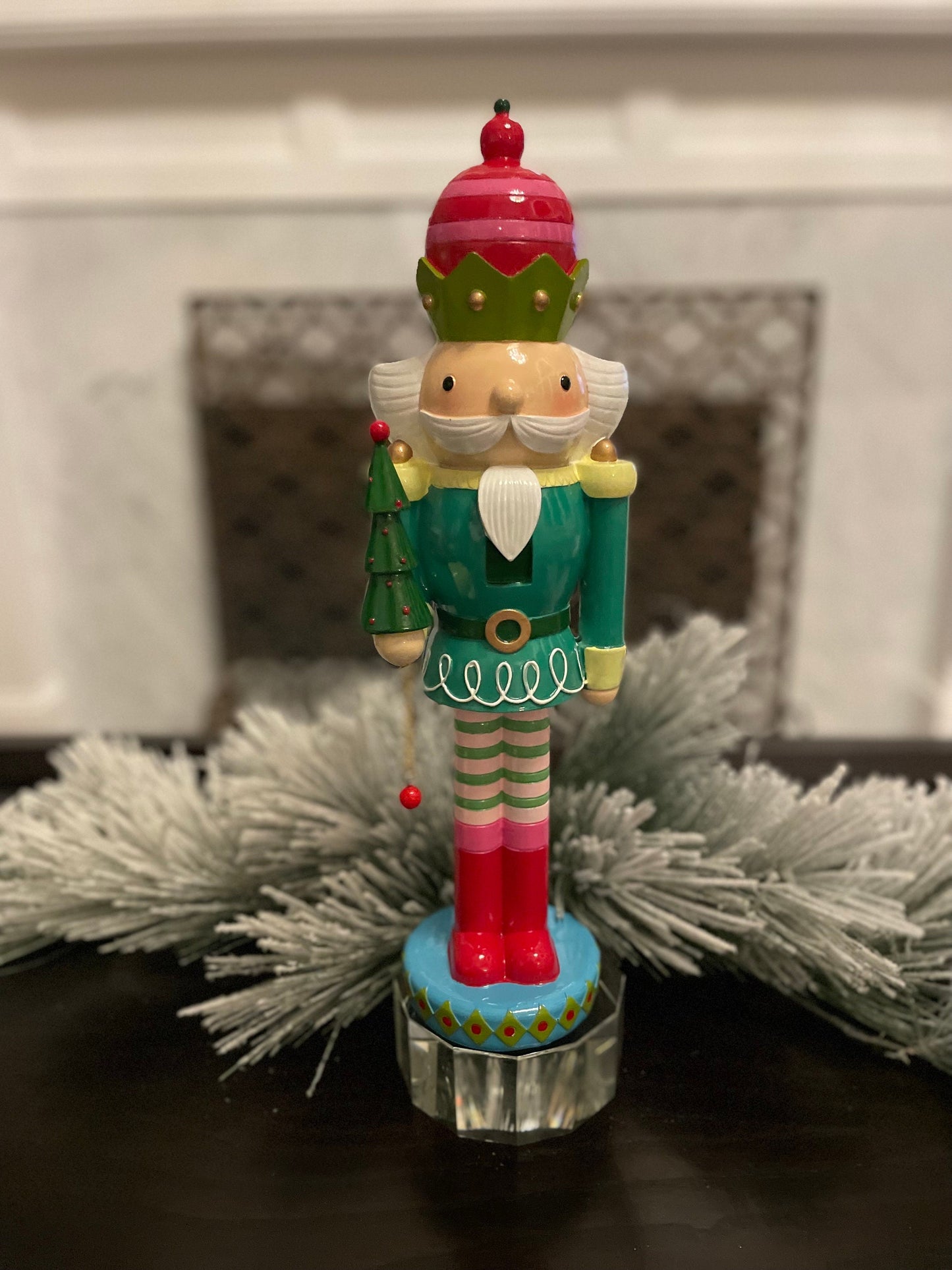 16.5” Nutcracker with tree, resin. Tabletop.