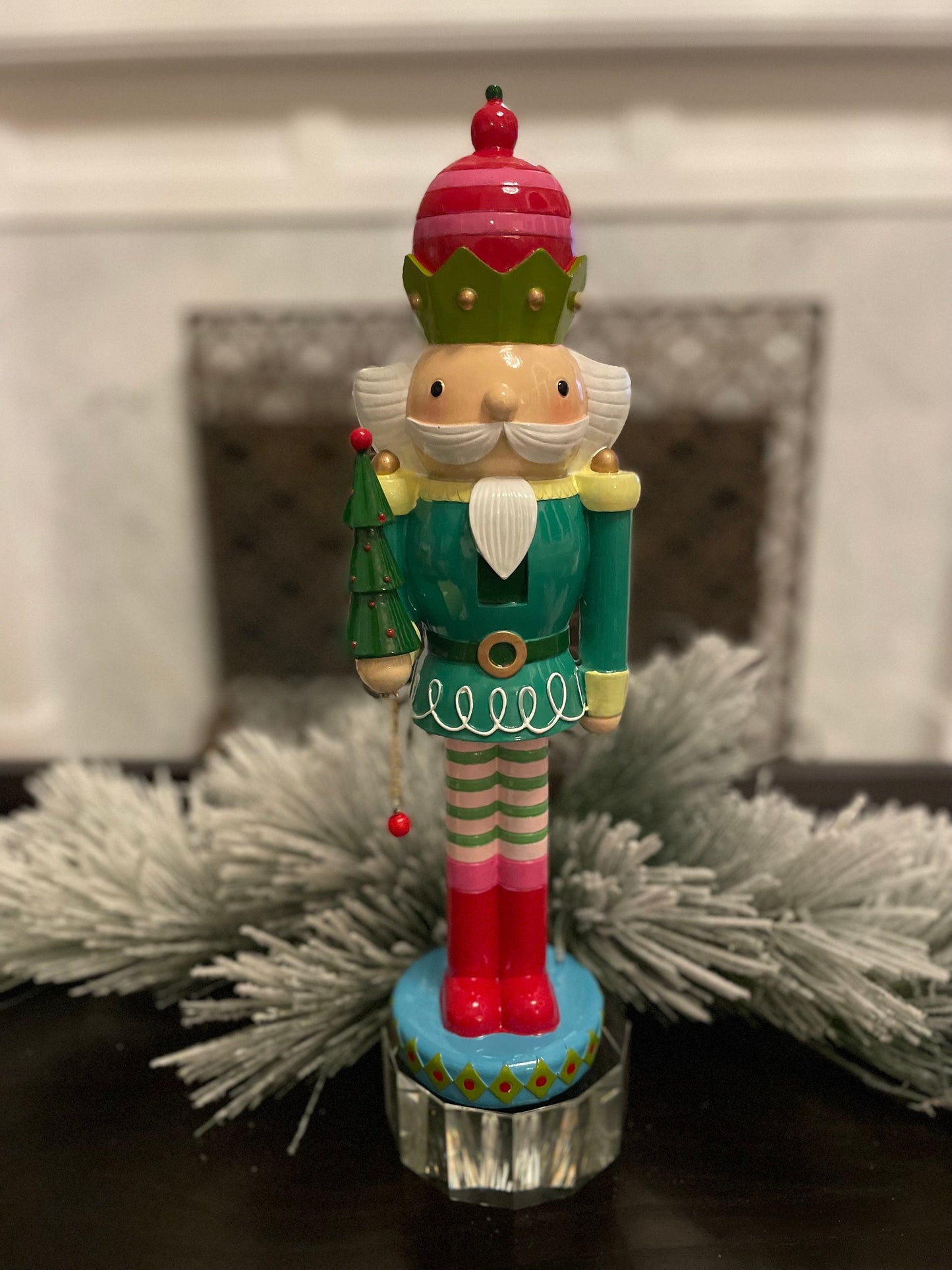 16.5” Nutcracker with tree, resin. Tabletop.