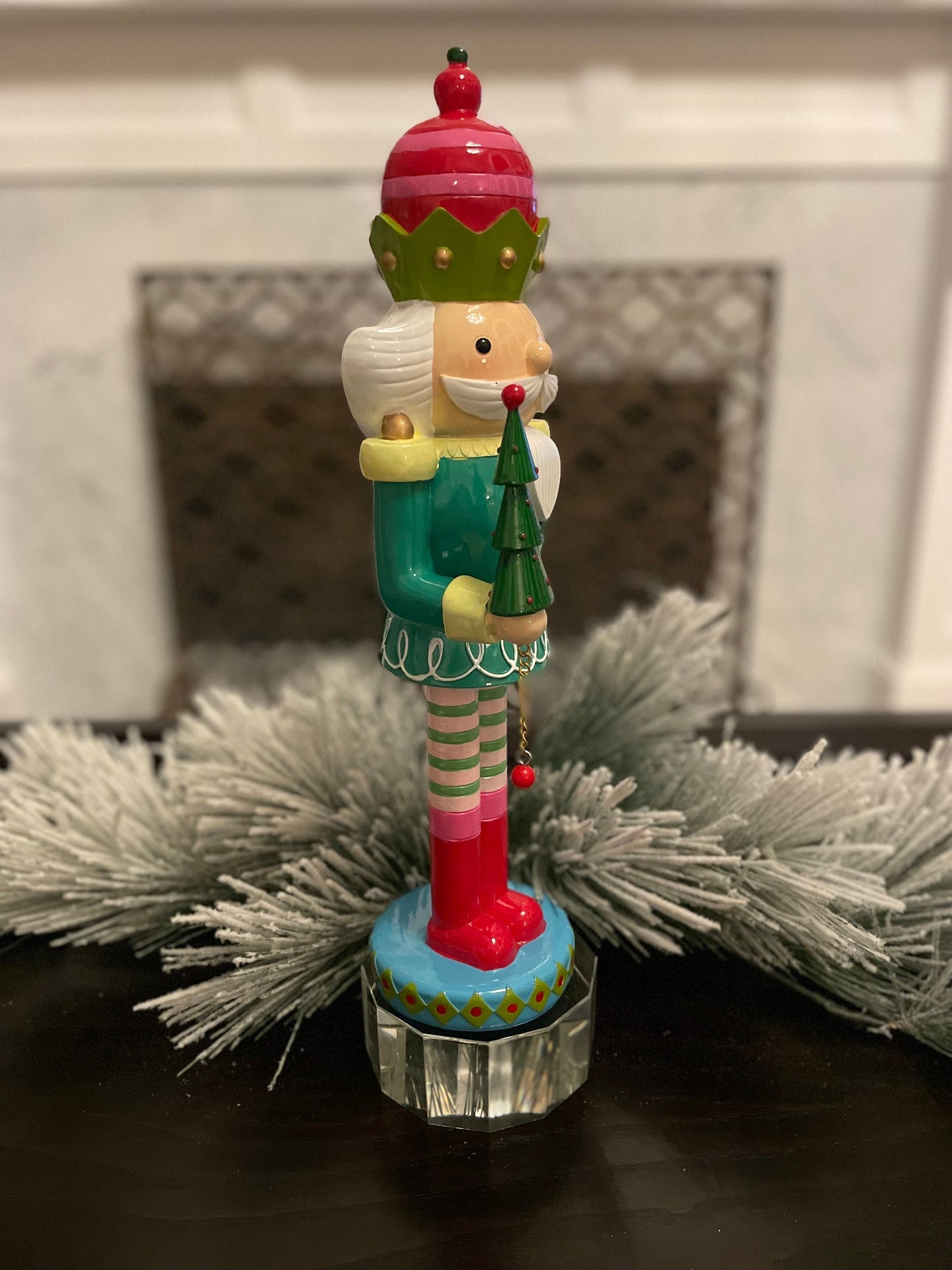 16.5” Nutcracker with tree, resin. Tabletop.