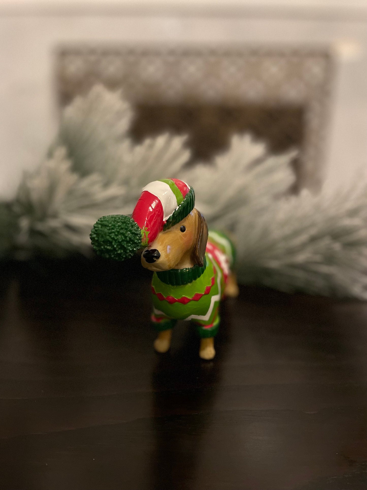 5.5” resin dachshund in Christmas sweater. Tabletop.