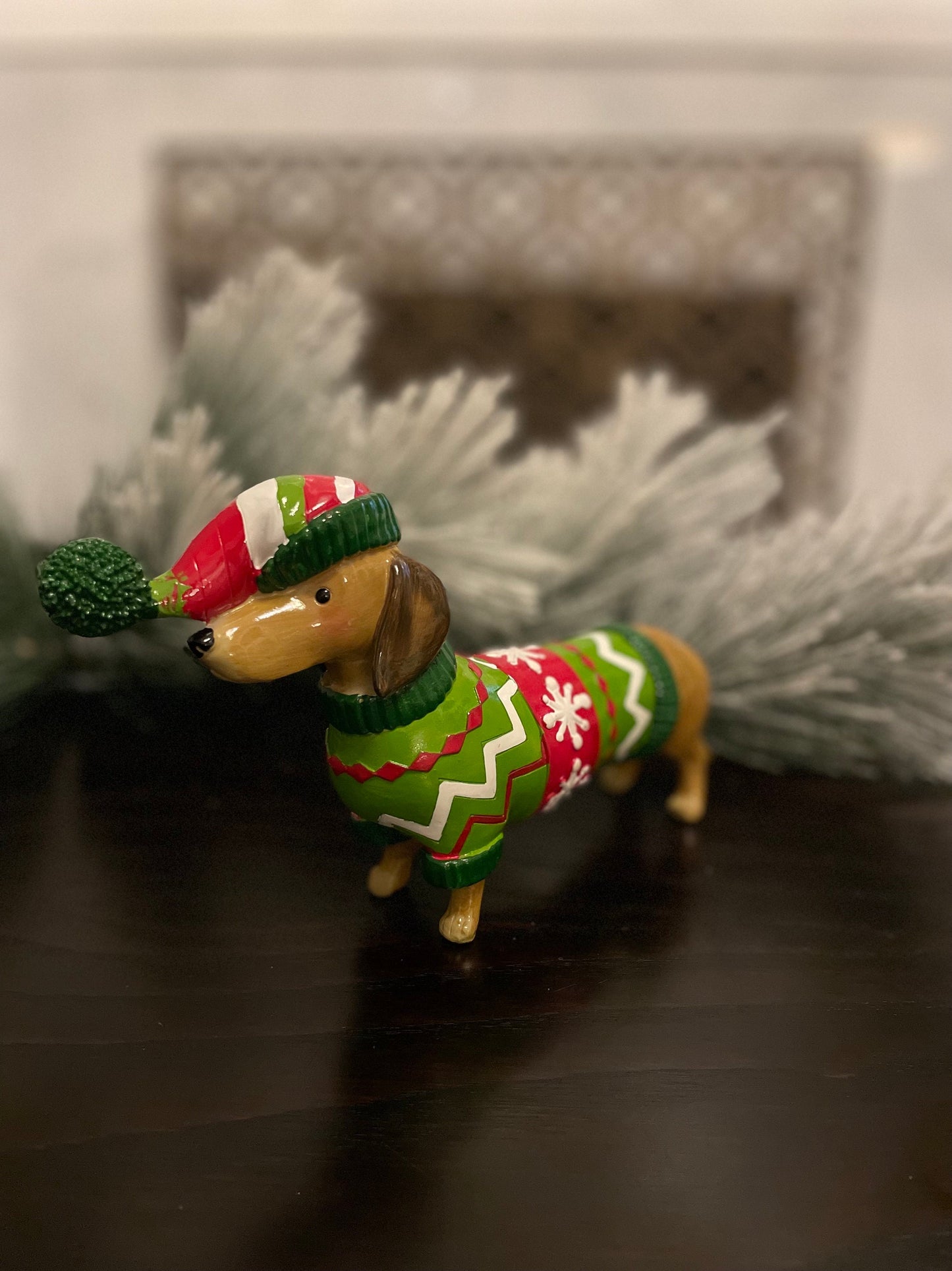 5.5” resin dachshund in Christmas sweater. Tabletop.