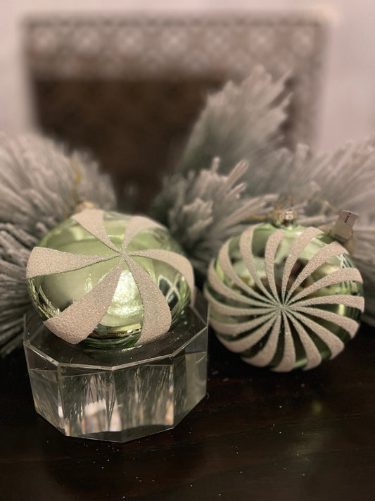Set of 2. 4" glass peppermint candy disk ornament. Green and white.