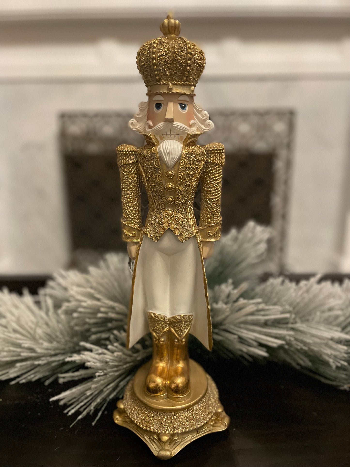 18” Nutcracker resin diamond opulent. Gold and white.