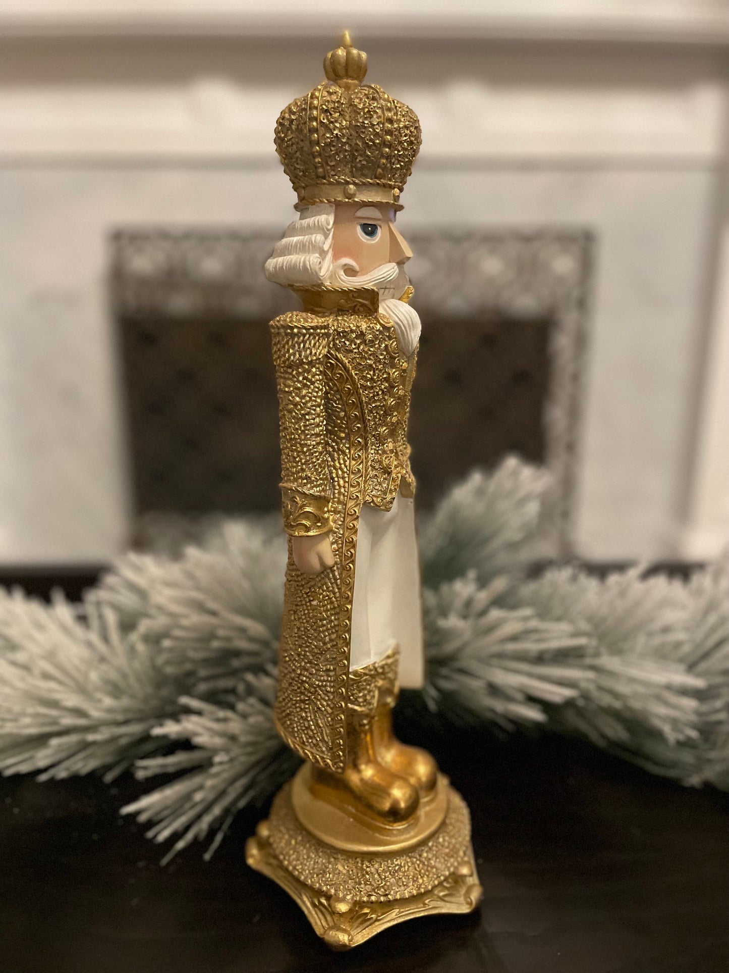 18” Nutcracker resin diamond opulent. Gold and white.