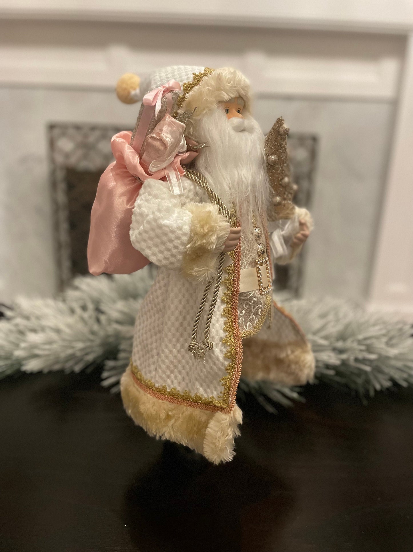 19" Santa holding a tree. Pink, ivory and gold.