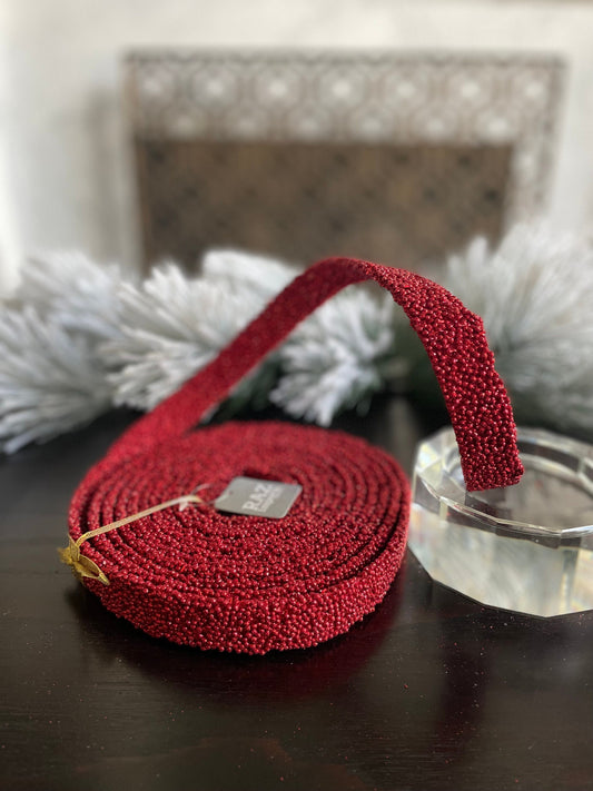 15’ L x 1”W Red beaded garland. Raz.