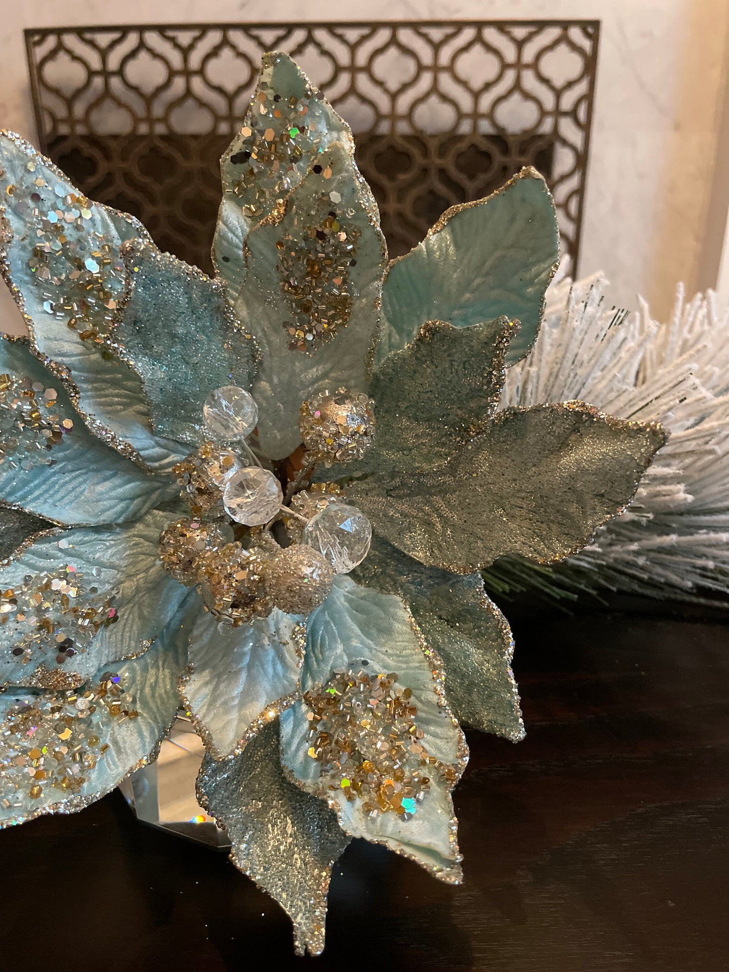 18" Poinsettia jewel stem. Soft blue platinum.