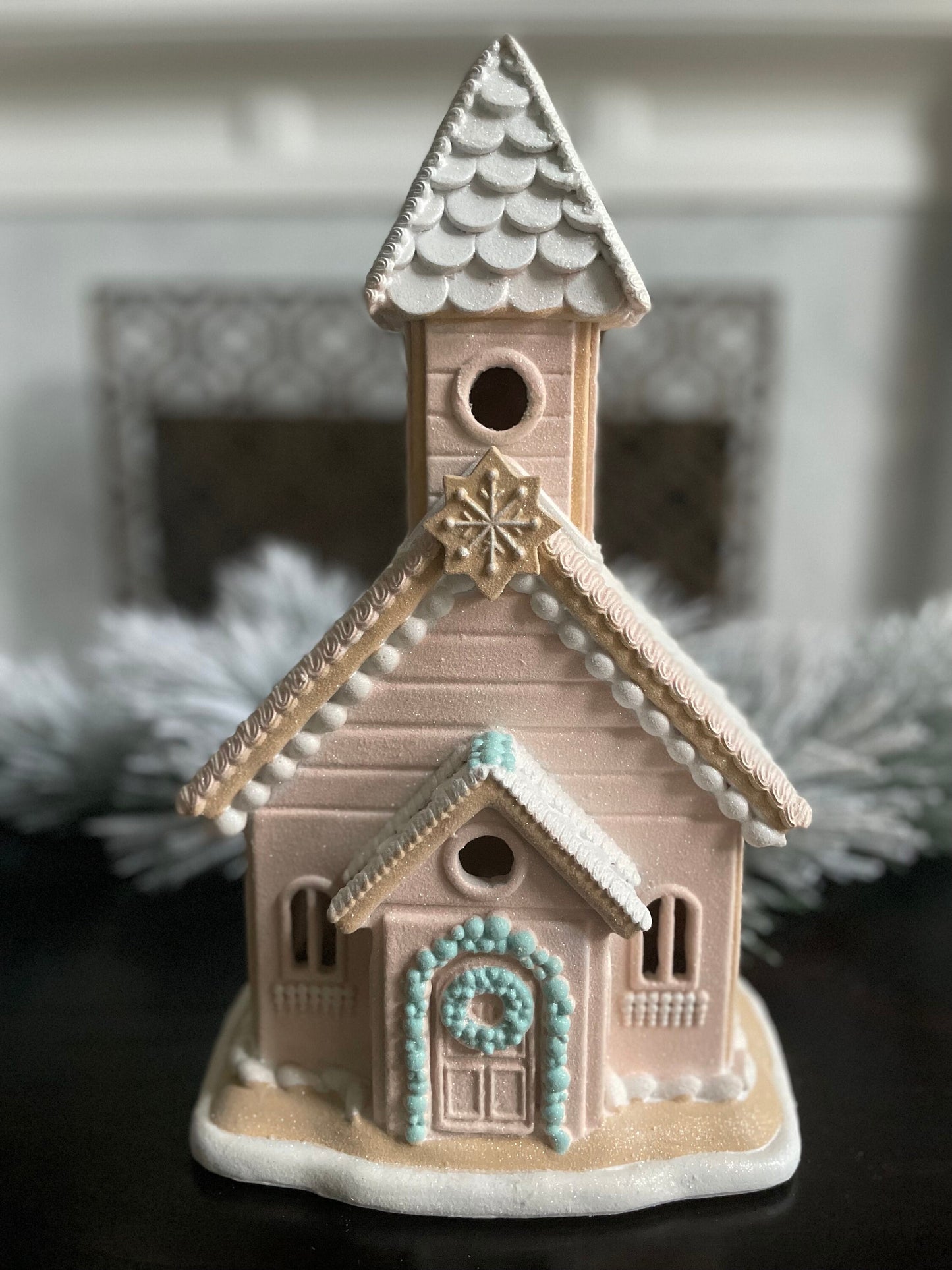 14”H x 8”W x 6” D. Gingerbread lighted church. Pink and blue.