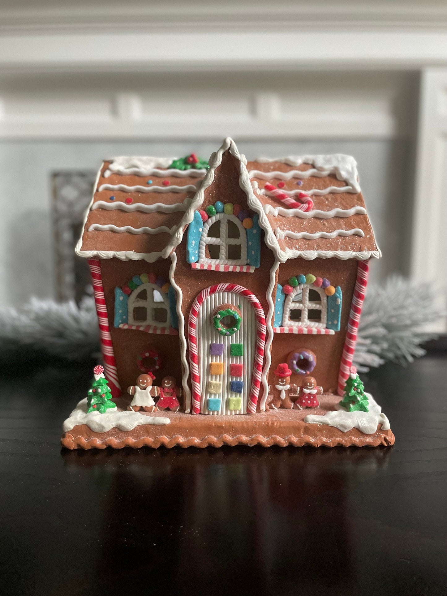 12"H x 13” W x 9” D. Lighted gingerbread house. Multicolor.