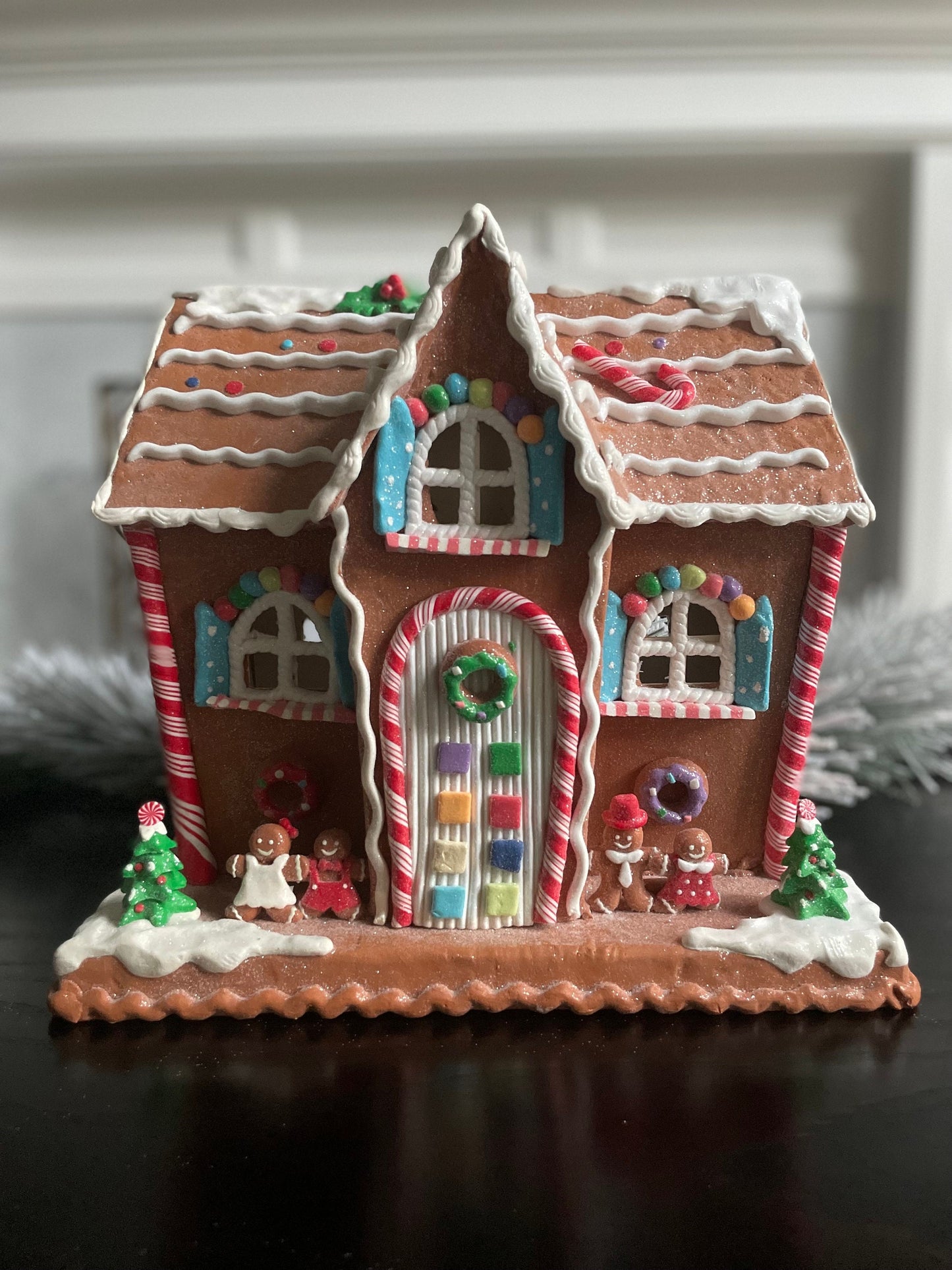 12"H x 13” W x 9” D. Lighted gingerbread house. Multicolor.