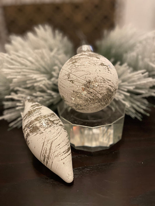Set of 2. 4”-6” glass whitewash mercury ball and finial.