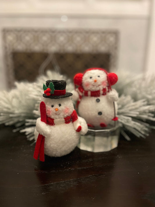 Set of 2. 6.5" Skiing Snowman ornament.