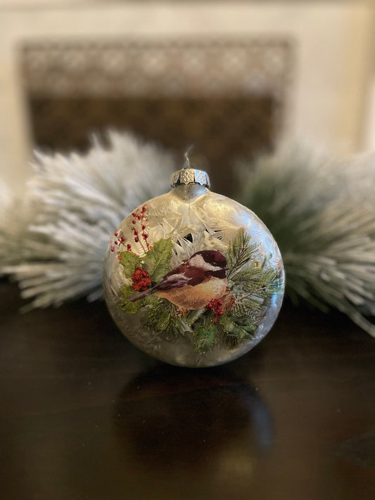 Set of 2. 5.5" Glass chickadee on pine/ berries disc ornament. So beautiful!