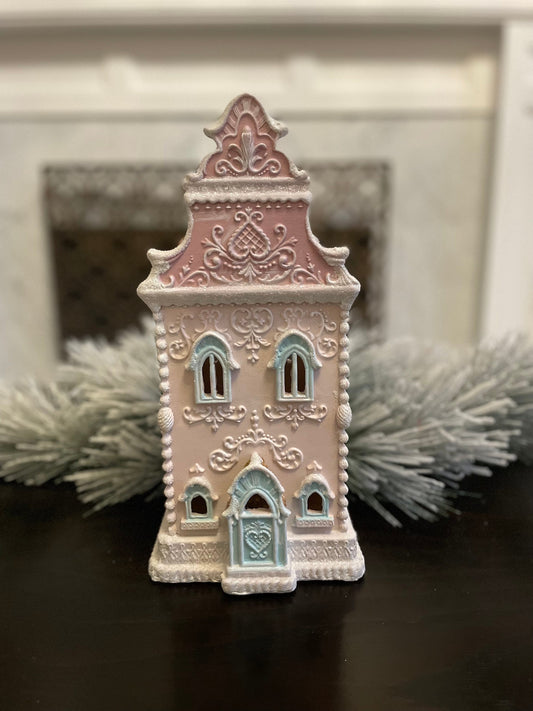 13” Gingerbread lighted house. Pastel pink and blue.