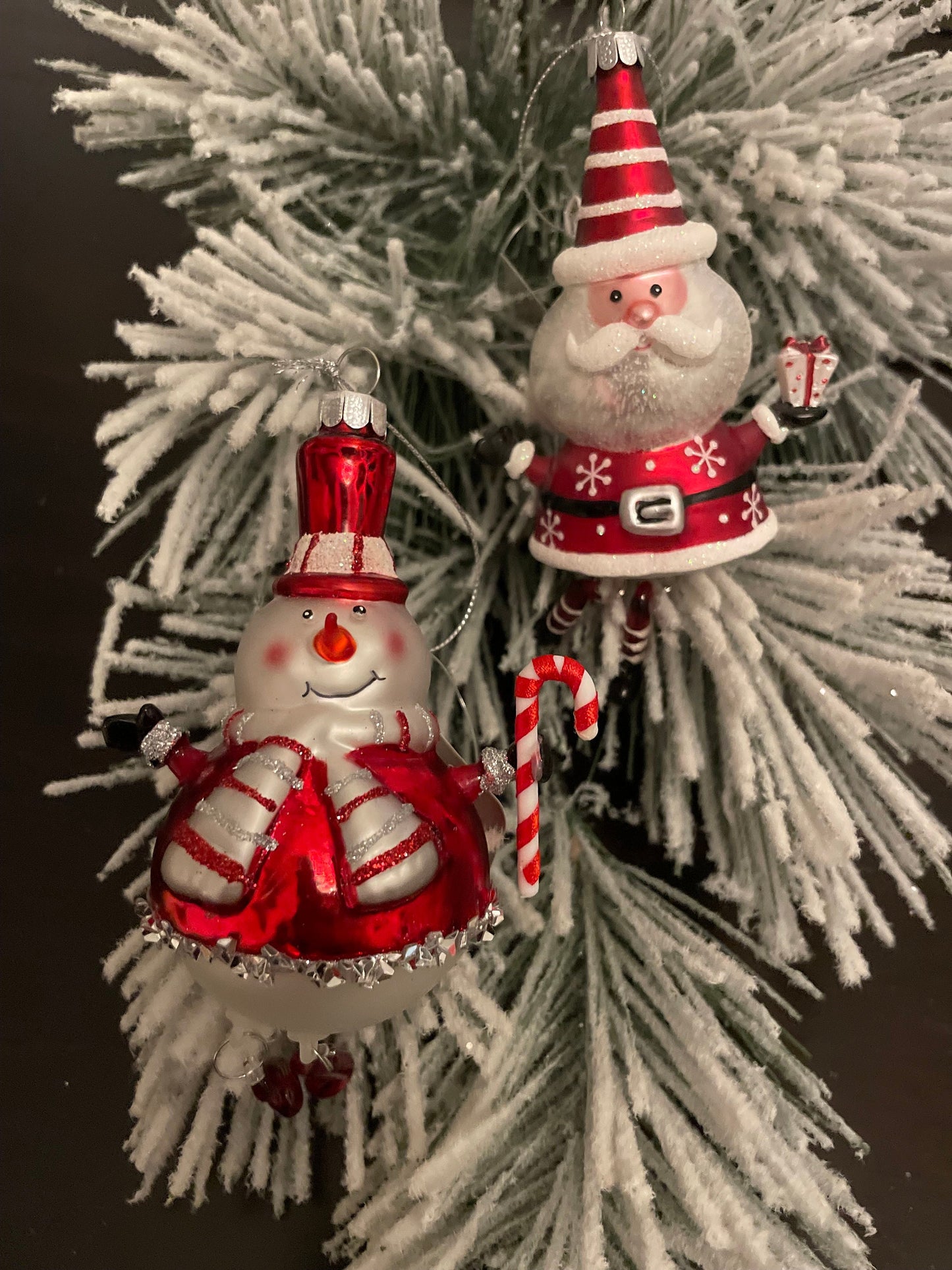 6.25” Santa and snowman glass ornaments.