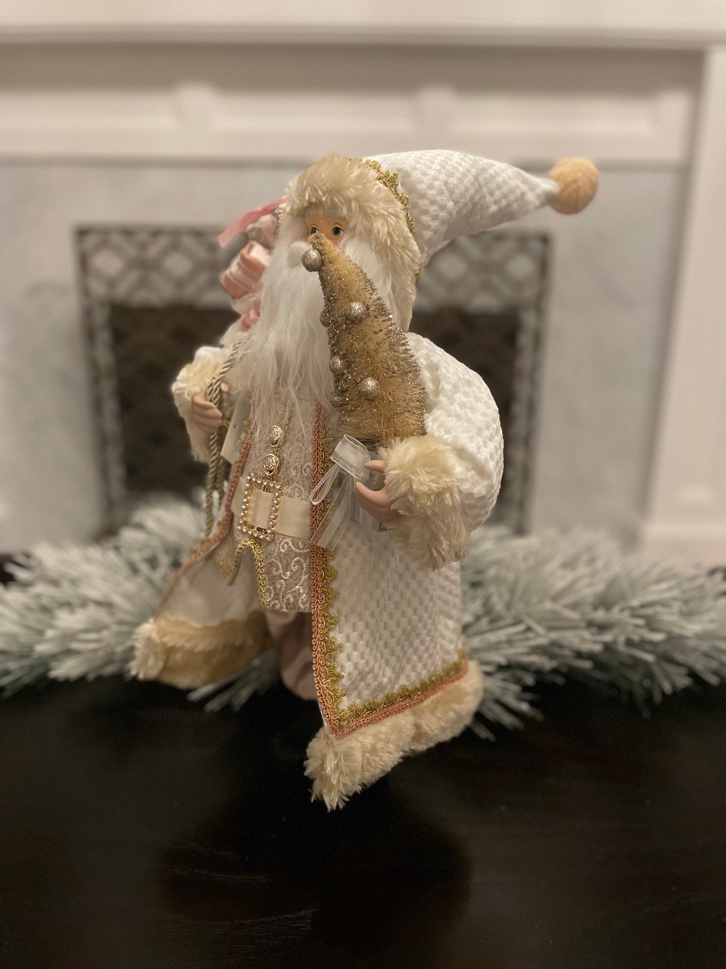 19" Santa holding a tree. Pink, ivory and gold.