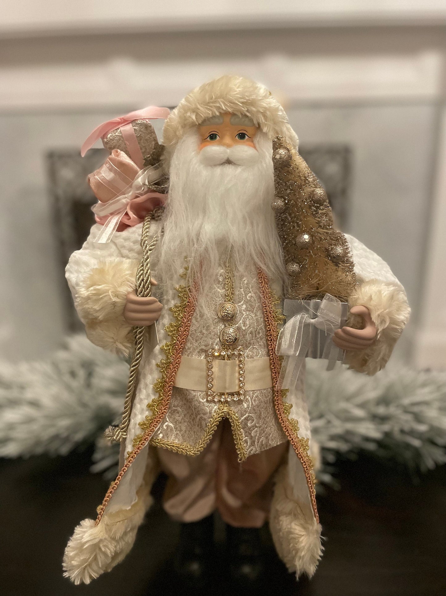 19" Santa holding a tree. Pink, ivory and gold.